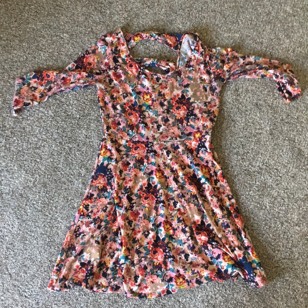 Floral dress with beautiful back cut out.